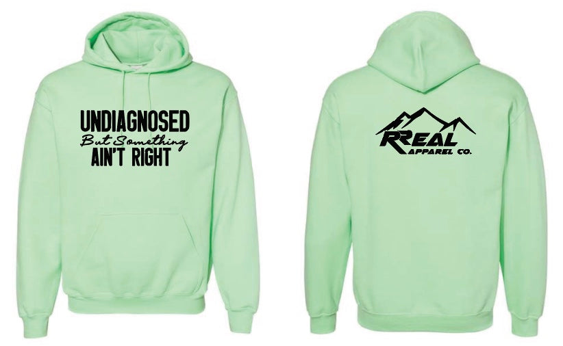 😵💫 Undiagnosed But Something Ain’t Right Hoodie