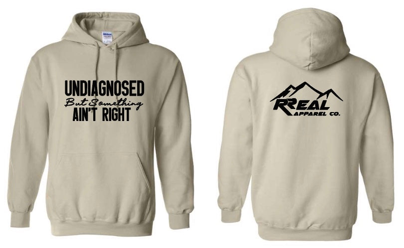 😵💫 Undiagnosed But Something Ain’t Right Hoodie
