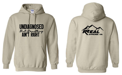 😵💫 Undiagnosed But Something Ain’t Right Hoodie